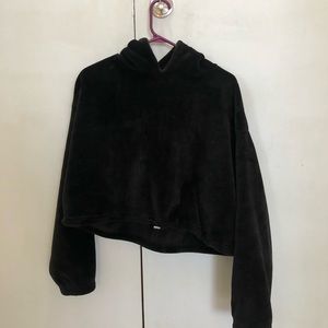Black cropped fleece sweater